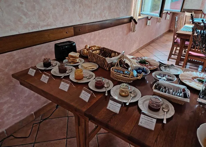 מלון Escape Garni